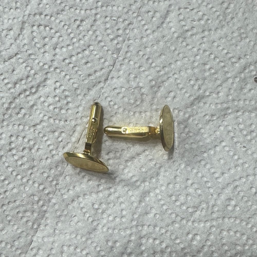 Gold Cufflinks.    Cristian Dior